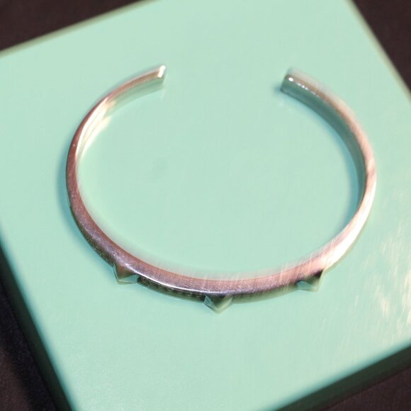 Silver-Tone Cuff Bracelet with Crystal Accents & Pyramid Stud Design - Picture 3 of 5